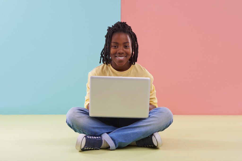  Person, Sitting, Head, Face, Happy, Child, Female, Girl, Computer, Electronics, Laptop, Pc, Smile, Clothing, Footwear, Shoe