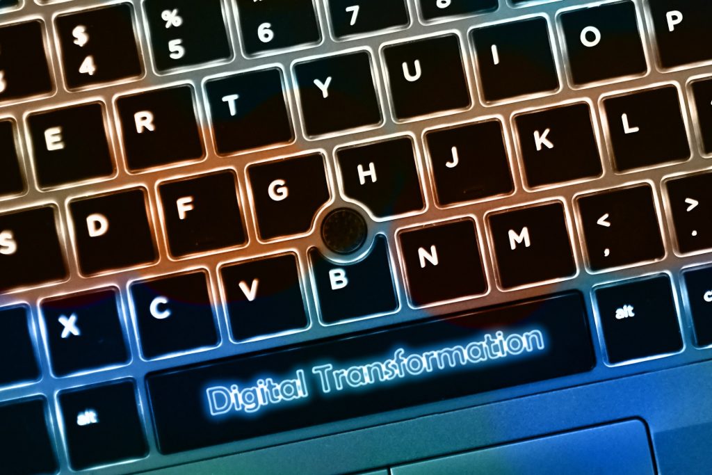 Digital Transformation concept - laptop computer keys