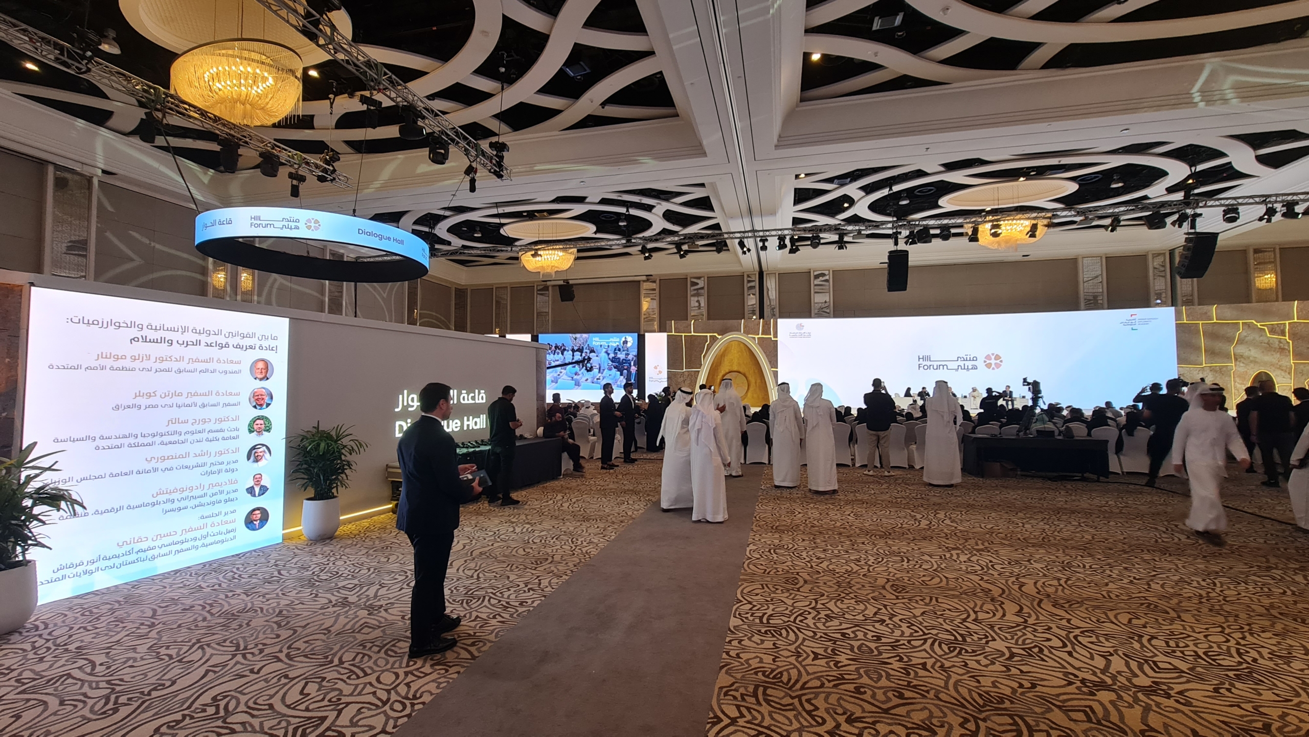 20250909_100805 People, Person, Indoors, Plant, Architecture, Building, Clothing, Footwear, Shoe, Electronics, Speaker, Computer Hardware, Hardware, Monitor, Screen, Hall, Crowd