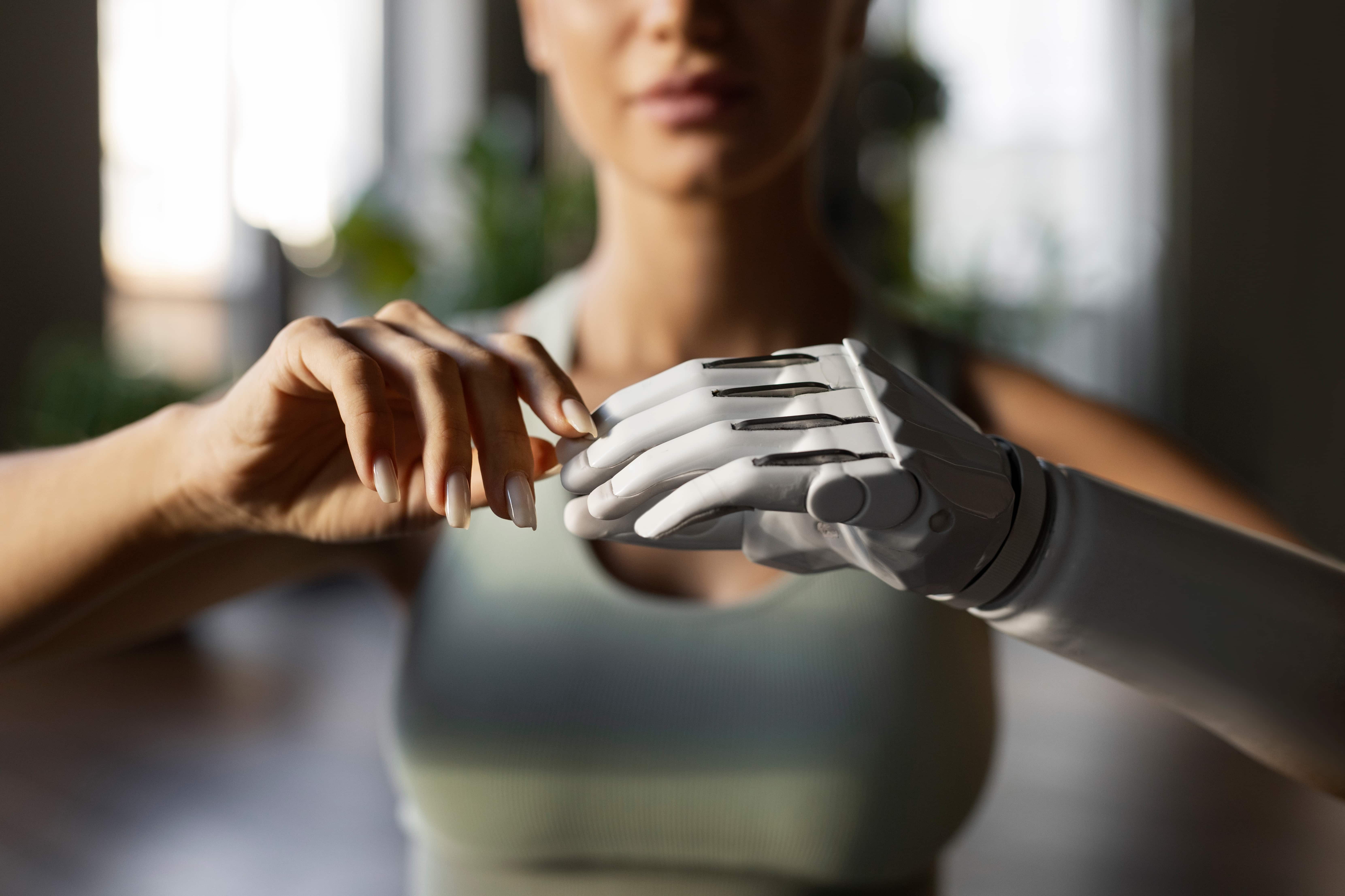 Wearable brain-computer interface pairs EEG with AI for robotic control