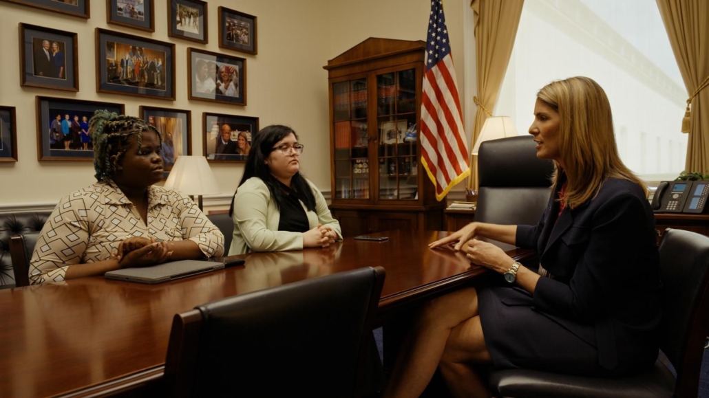Reflections on the documentary 'Abuse in the World of Online Games' 7 The image shows a photograph of three people sitting at a table