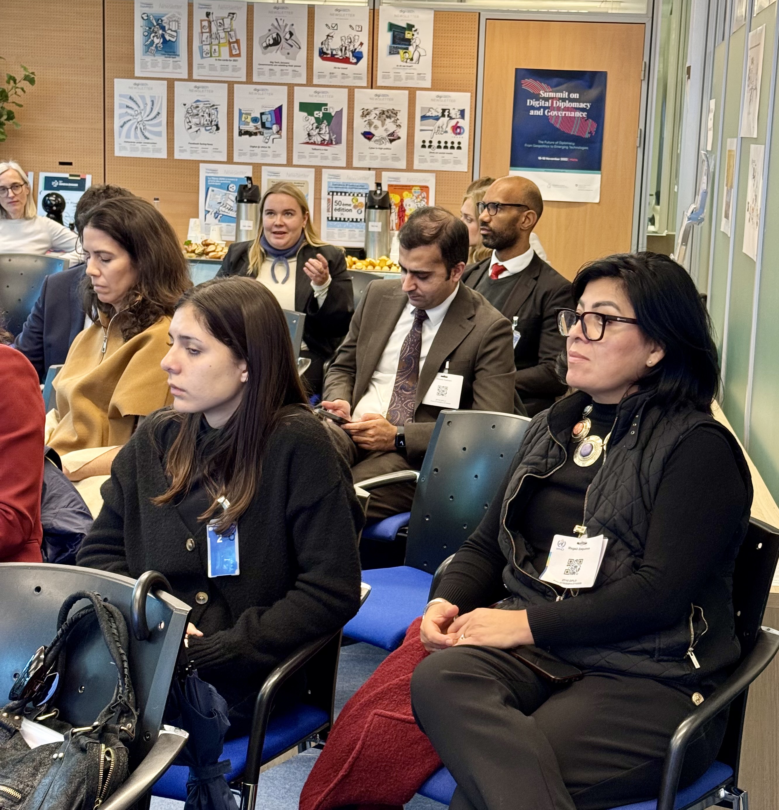 IMG_4129 Adult, Female, Person, Woman, Accessories, Glasses, Male, Man, Jewelry, Necklace, Clothing, Glove, Chair, Furniture, Face, Head, Bag, Handbag, Wristwatch, Indoors, Formal Wear, Suit, Crowd, Student, Natalia Contesse, Antonio Esfandiari, Cyrille Diabaté, Laura Räty