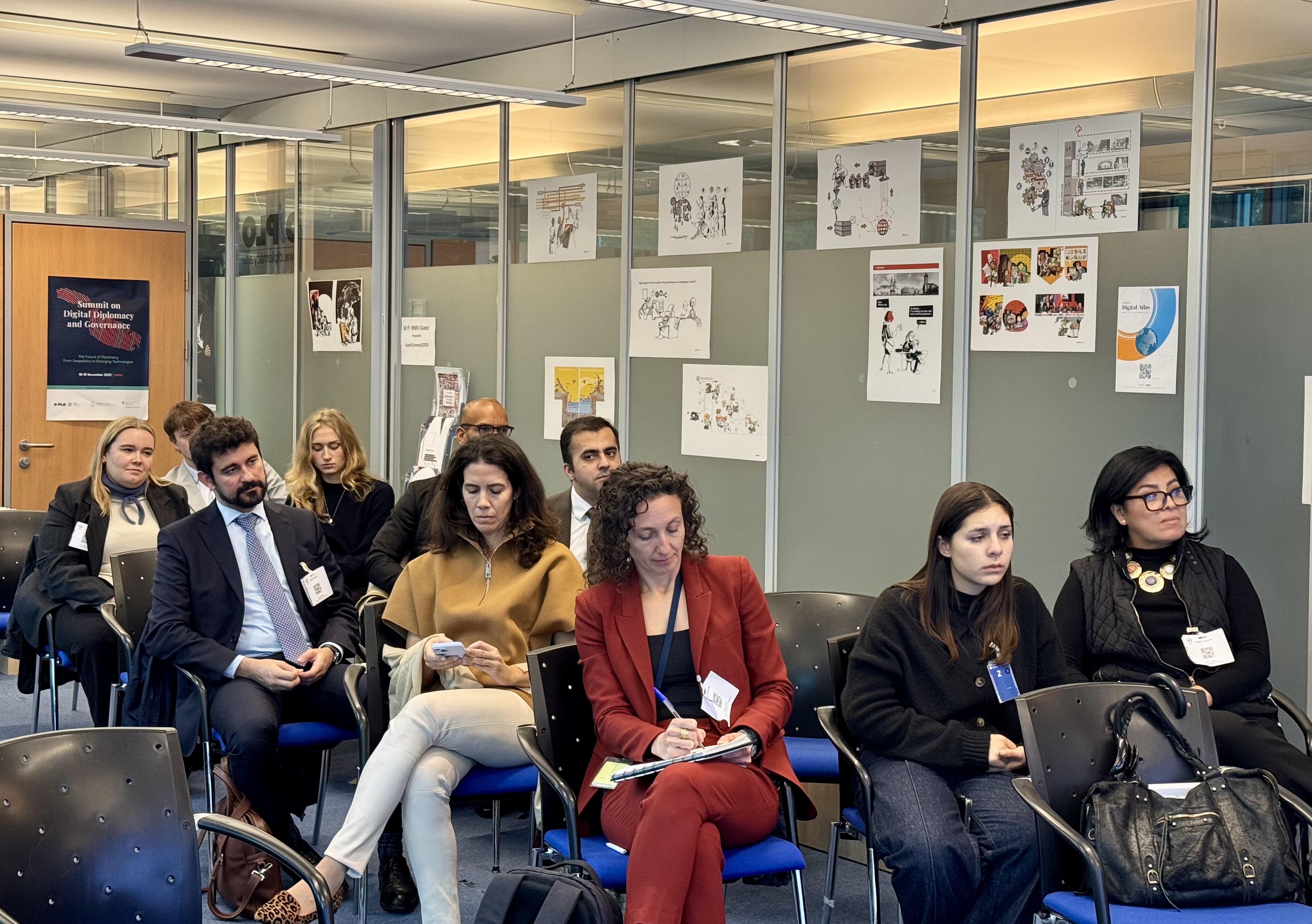 IMG_4132 Adult, Female, Person, Woman, Accessories, Bag, Handbag, Glasses, Clothing, Footwear, Shoe, Male, Man, Formal Wear, Tie, Pen, People, Jewelry, Necklace, Indoors, Electronics, Mobile Phone, Phone, Chair, Furniture, Crowd, Lamp, Computer, Laptop, Pc, Groupshot, Laura Räty