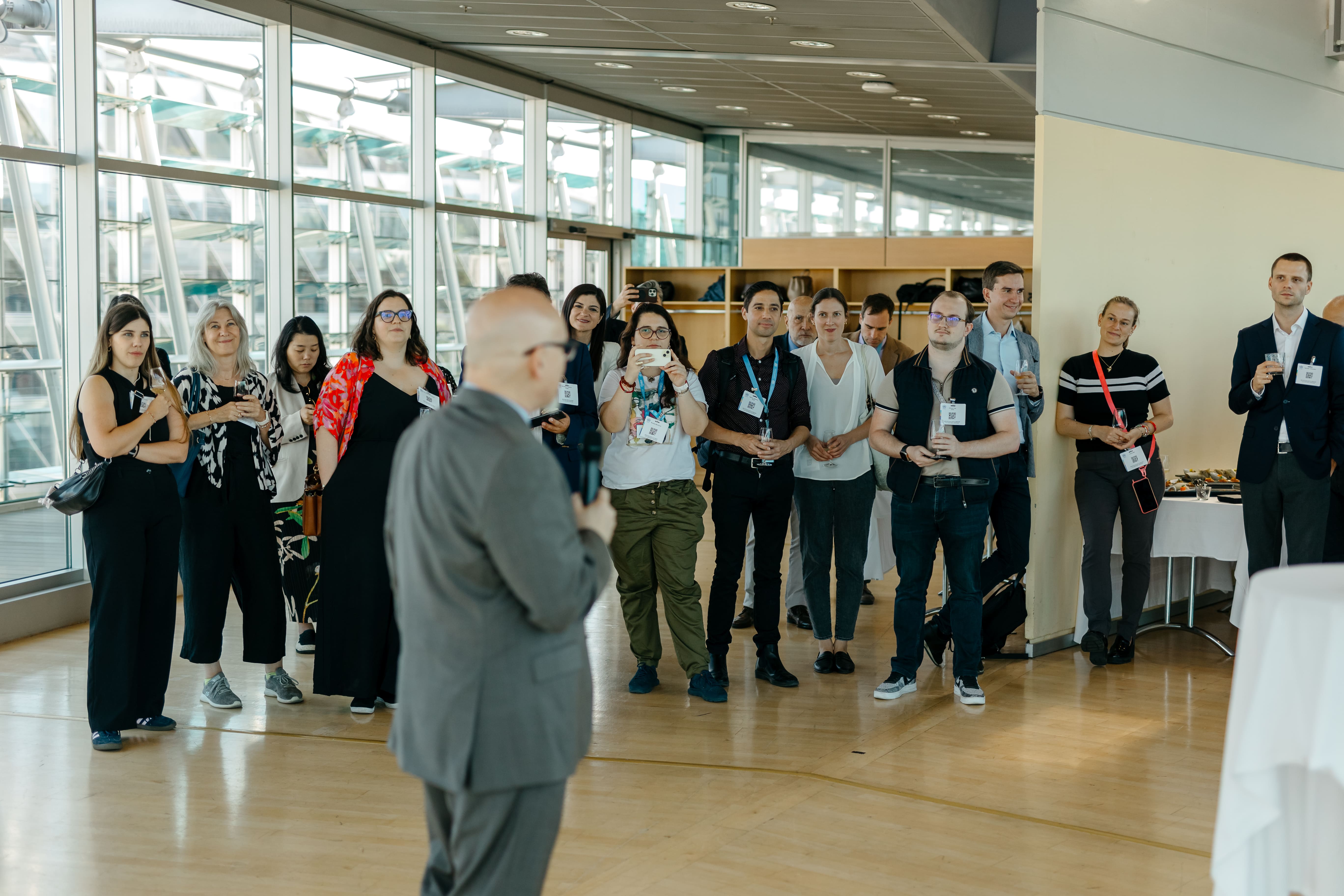 LAZA1874-min Adult, Female, Person, Woman, Clothing, Footwear, Shoe, Male, Man, Accessories, Bag, Handbag, Groupshot, Glasses, Wristwatch, Jewelry, Necklace, Coat, Desk, Furniture, Table, People, Rachel Kramer Bussel, Juho Kuosmanen, Kamar de los Reyes, Mariah Gale, Kathryn Calder, Chen Zhili, Cheryl McKay