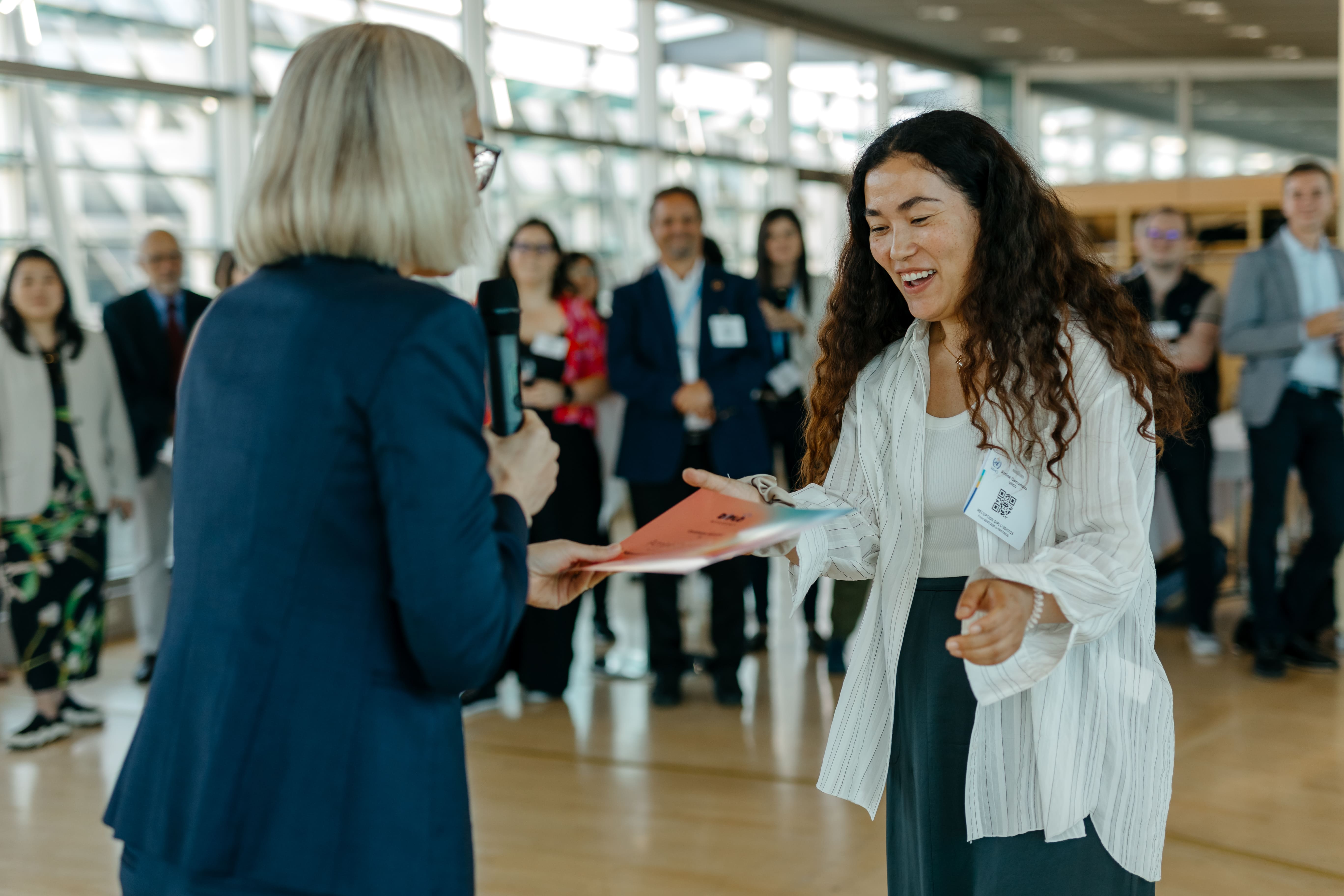 LAZA2151-min Adult, Female, Person, Woman, Conversation, Electrical Device, Microphone, Clothing, Footwear, Shoe, Accessories, Glasses, Face, Happy, Head, Smile, Coat, Stan Van Gundy, Kate Beaton