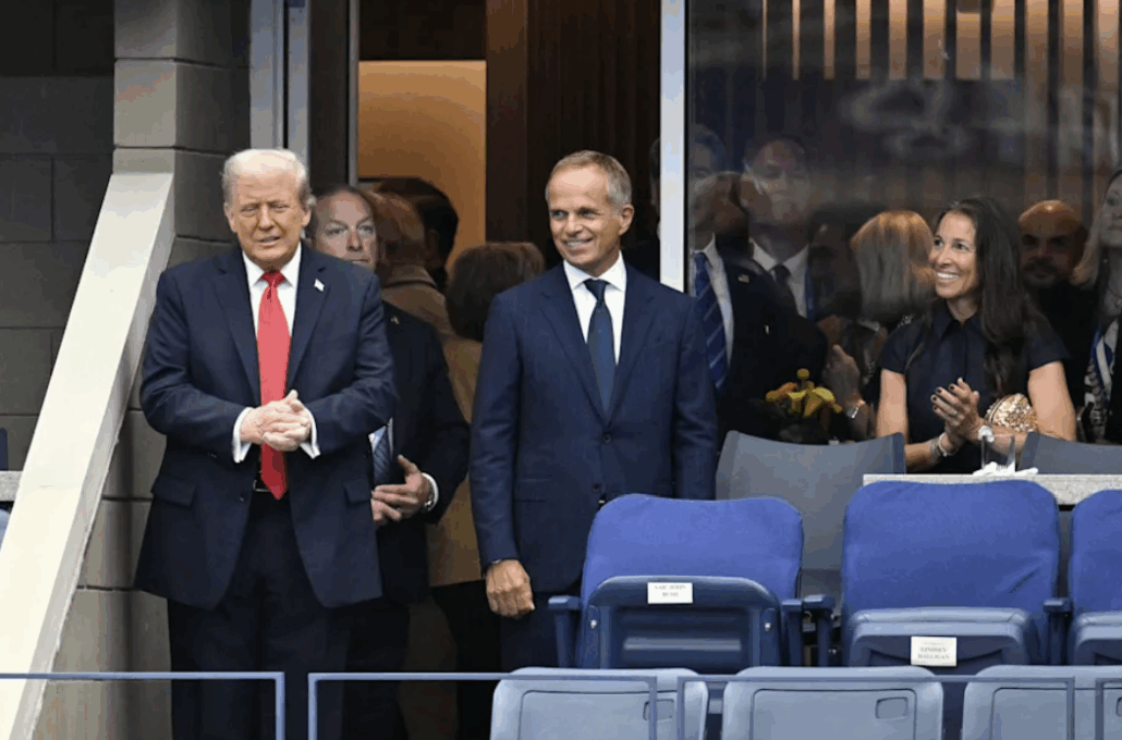 The image shows a photograph of Donald Trump and Jean-Frederic Dufour at the US Open