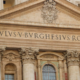 The Vatican's diplomacy is an unlikely power 3 A building with columns and a sign