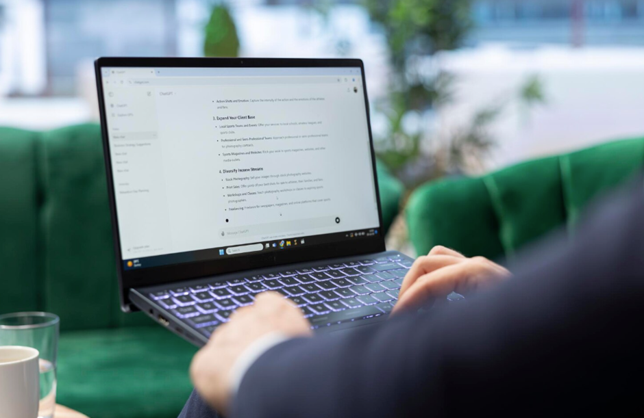 Inside NeurIPS 2025: How AI research is shifting focus from scale to understanding 3 Computer, Electronics, Laptop, Pc, Computer Hardware, Computer Keyboard, Hardware, Monitor, Screen, Cup, Person, Text