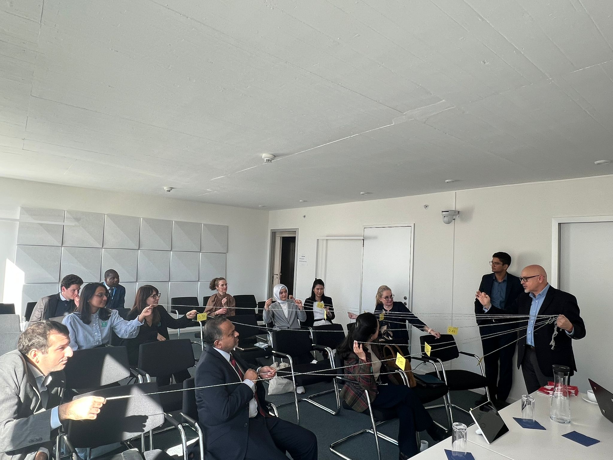 14th WTO Ministerial Meeting - Yaoundé 1 People, Person, Adult, Female, Woman, Male, Man, Indoors, Crowd, Computer, Electronics, Laptop, Pc, Accessories, Glasses, Architecture, Building, Classroom, Room, School, Hall, Audience, Bag, Handbag, Mahadev Jankar, Hendrik Kerstens, Cheryl Chase, Kweku Adoboli, Delphine Batho, Fatma Betül Sayan Kaya, Amy Khor