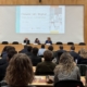 IMG_5423 People, Person, Crowd, Adult, Female, Woman, Architecture, Building, School, Classroom, Indoors, Room, Accessories, Bag, Handbag, Male, Man, Audience, Chair, Furniture, Lecture, Hall, Clothing, Formal Wear, Suit, Face, Head, Flag, Computer, Electronics, Laptop, Pc, Lecture Hall, Mark Pocan, Donna Strickland, Rachel Reeves