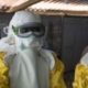The uncertain ethics of Ebola treatments 5 Clothing, Coat, Person, Akeel Lynch