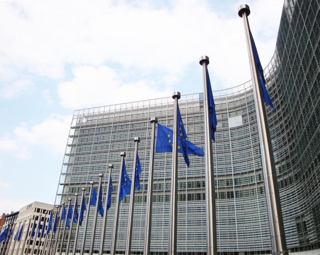 Digital Omnibus on AI: The EU's AI Act simplification and new AI Office powers 1 Architecture, Building, Office Building, City, Urban, High Rise, Flag