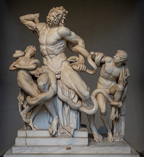 The image shows an ancient Greek marble statue of Laocoon and his sons